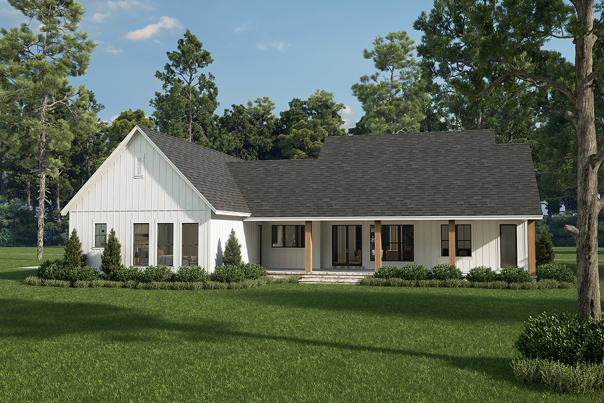 Rear exterior of House Plan 82919 highlighting spacious covered porch and outdoor living areas