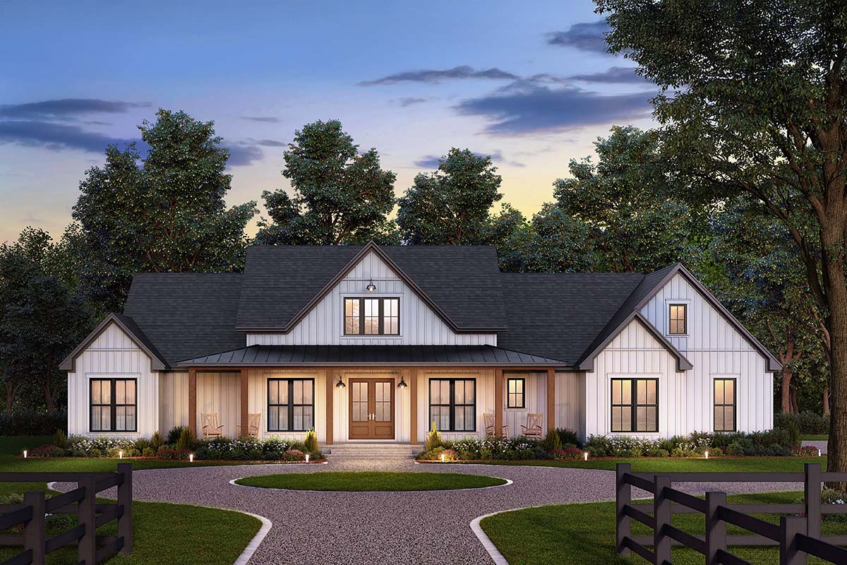Front rendering of Modern Farmhouse Plan 82951 with covered porch, double entry doors, and gabled roof