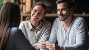 Homeowner reviewing a construction loan rate lock agreement with lender