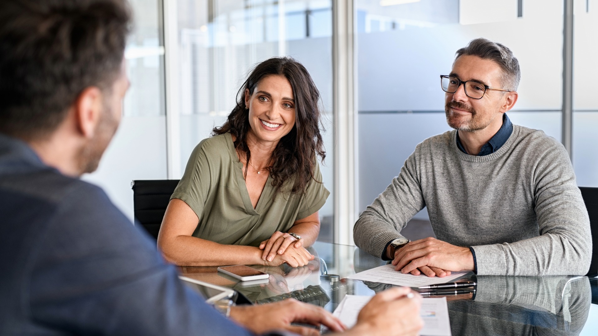 Homeowner meeting with loan officer for construction loan prequalification
