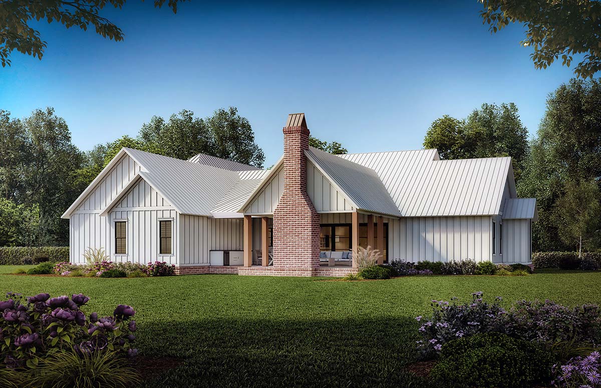 Outdoor living area of Modern Farmhouse Plan 41476 with vaulted ceiling, fireplace, and outdoor kitchen