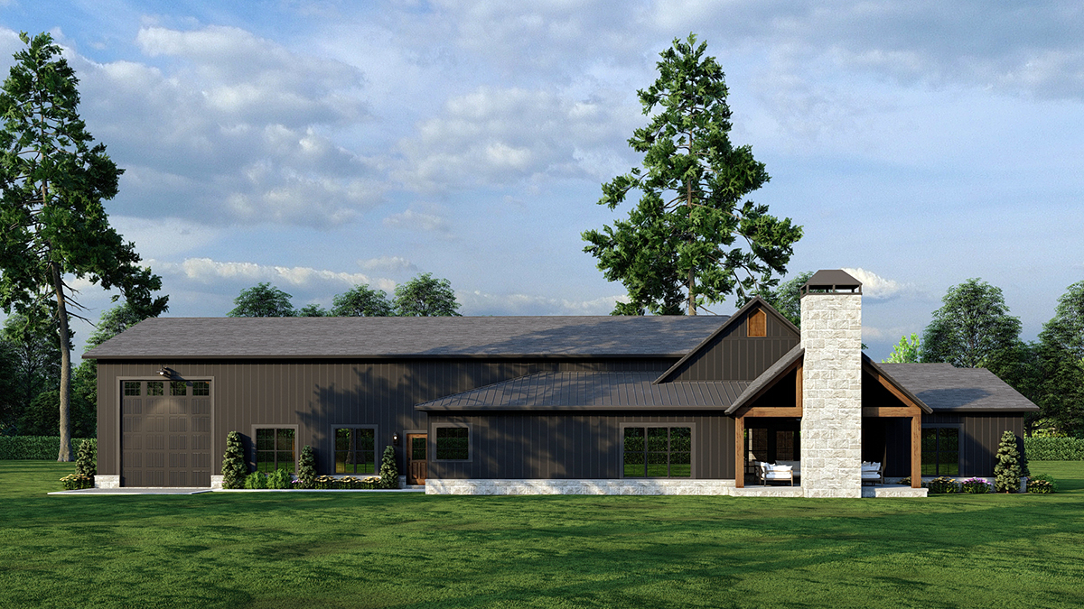 Rear elevation rendering of Barndominium Style House Plan 82783 showing covered grilling porch, outdoor living area, and tall windows