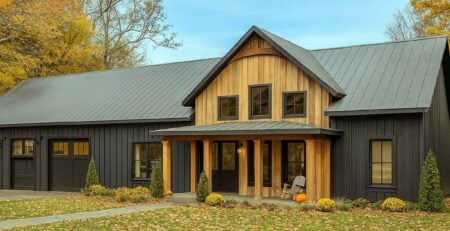 Front rendering of Barndominium House Plan 77460 featuring covered porch and tall gabled roofline