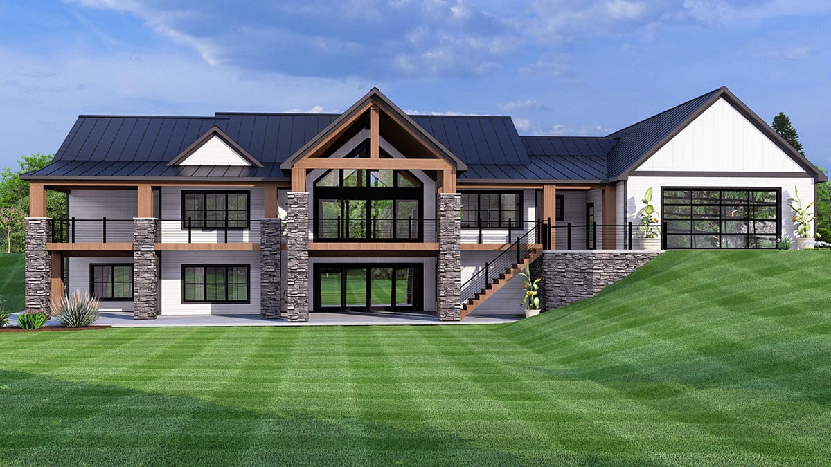 Rear elevation of Farmhouse Plan with Craftsman Style 43960 showing expansive covered porch
